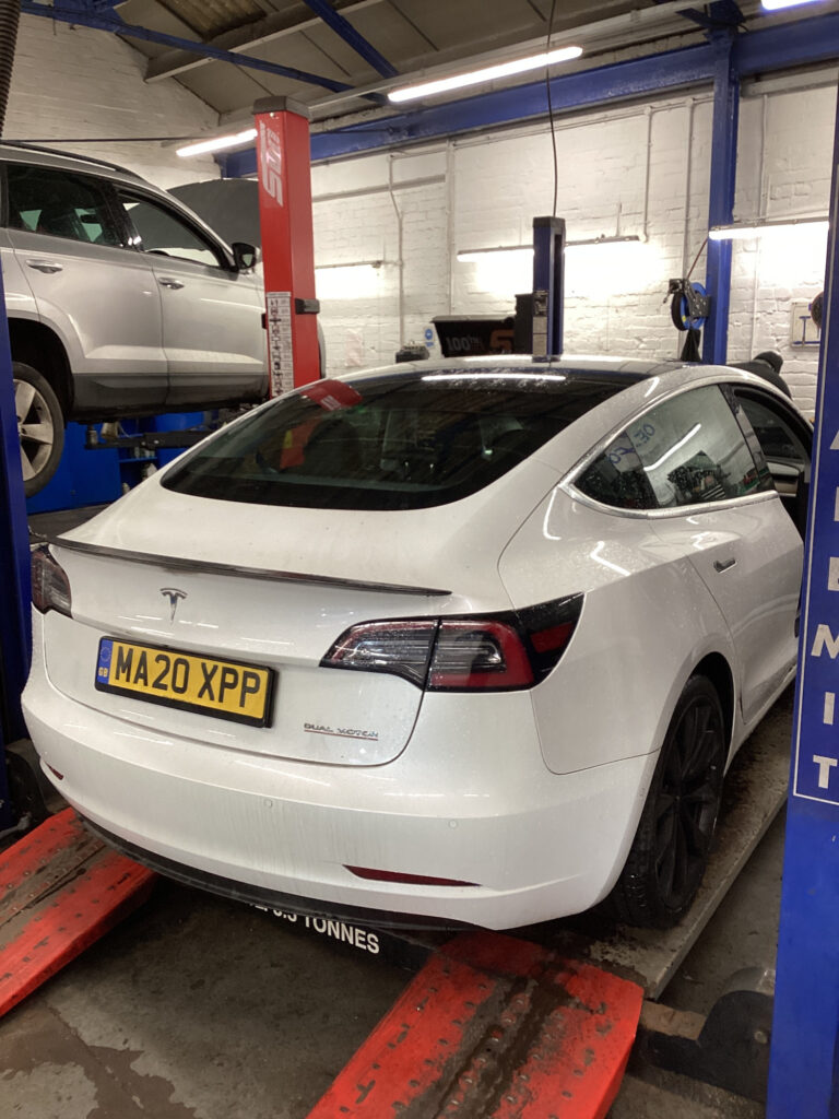 Tesla Model 3 undergoing diagnostic inspection at Lindleys Autocentres
