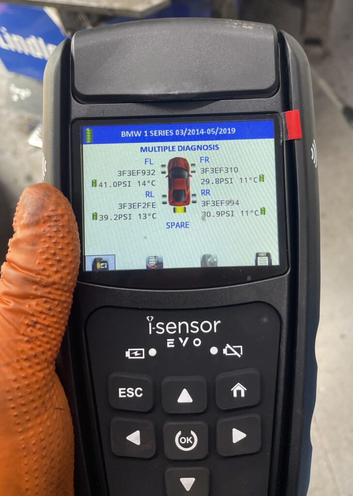 TPMS diagnostic tool reading all four tyre pressure sensors during a free TPMS check at Lindleys Autocentres