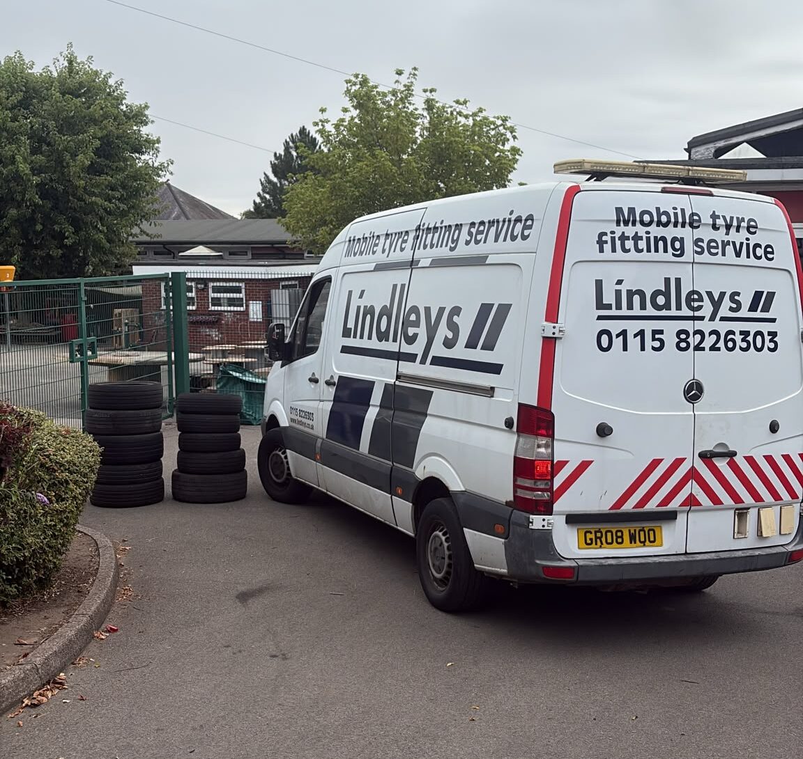 Lindleys mobile tyre fitting van delivering free scrap tyres to a Nottingham school