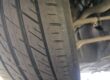 Front tyre with tread still in the centre but the outer shoulder worn smooth
